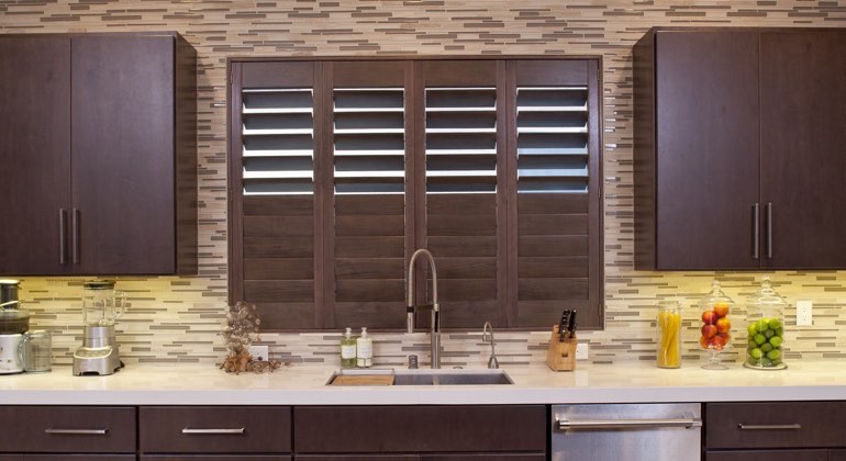 Divider rail shutters in a San Jose kitchen. San Jose cafe kitchen shutters